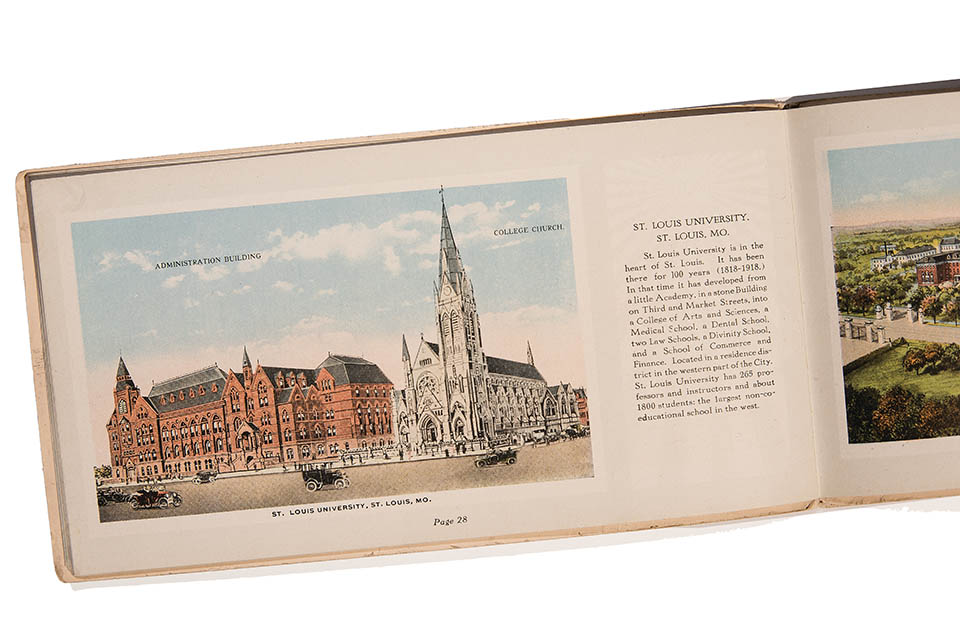 SLU history book Book open to an illustration of DuBourg Hall and College Church