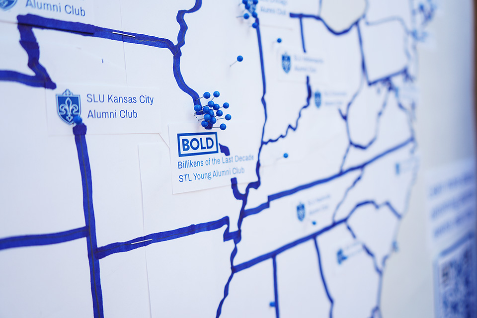 A map of the U.S. with pins marking alumni clubs.