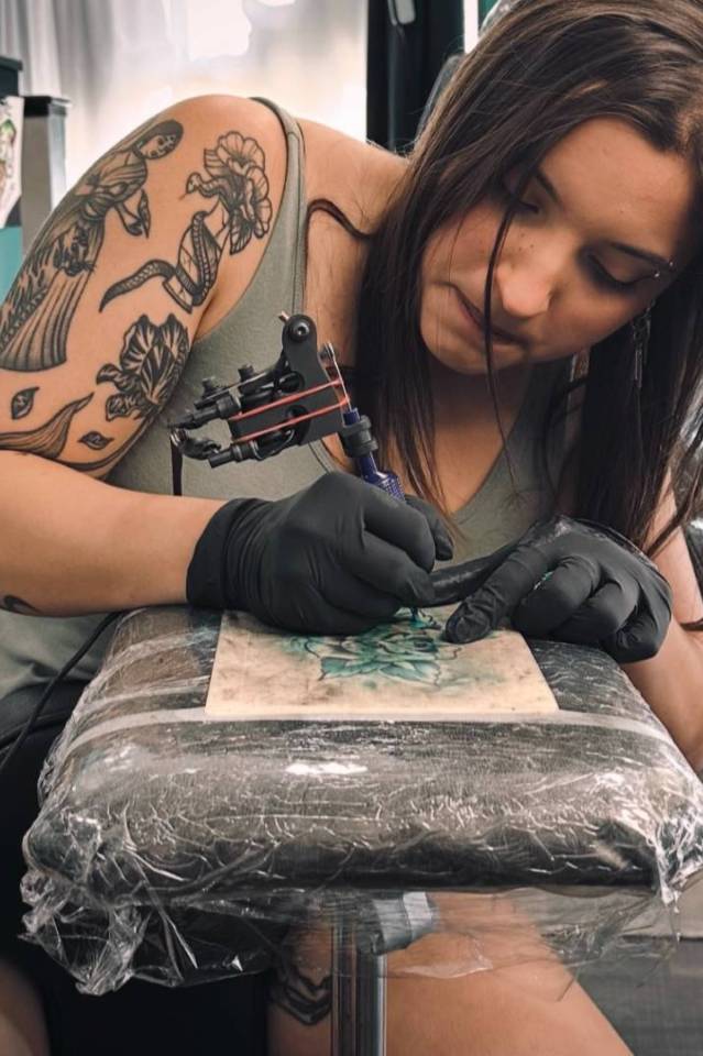 Student tattoo artist