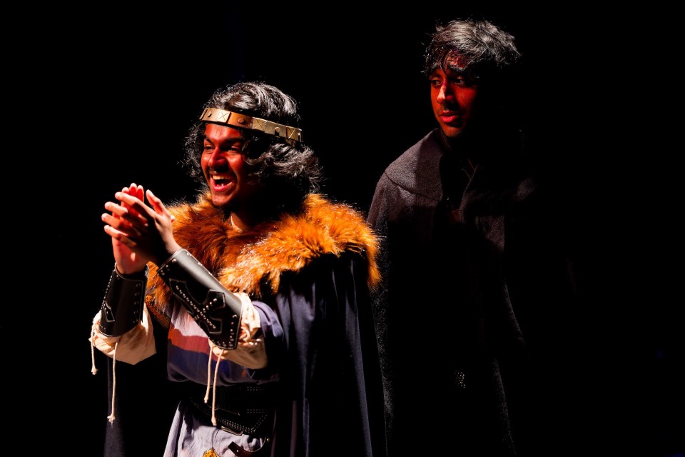 two actors in medieval costumes