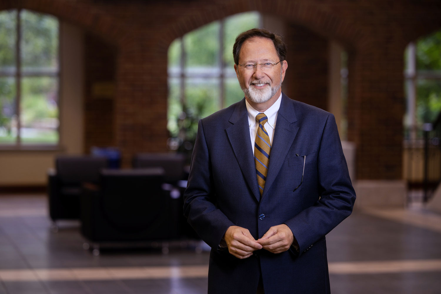 Jackson Nickerson, Ph.D., Edward Jones Dean of the Chaifetz School of Business poses on the staircase of Cook Hall. Jackson Nickerson, Ph.D., Edward Jones Dean of the Chaifetz School of Business poses on the staircase of Cook Hall.