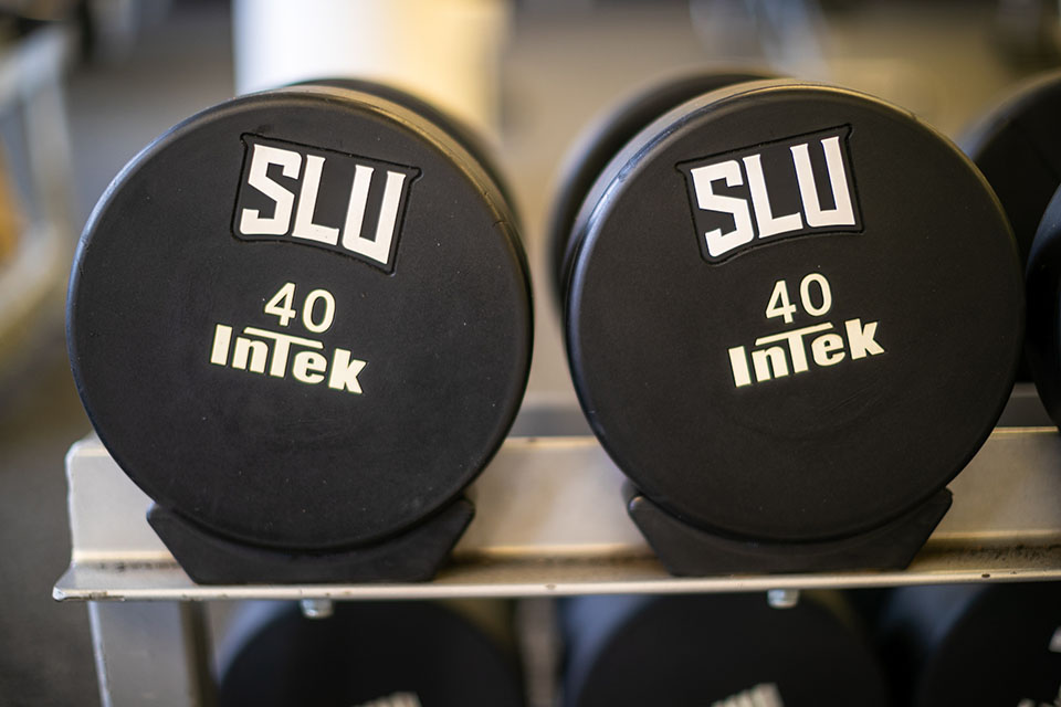 SLU weights A pair of hand weights with SLU on them