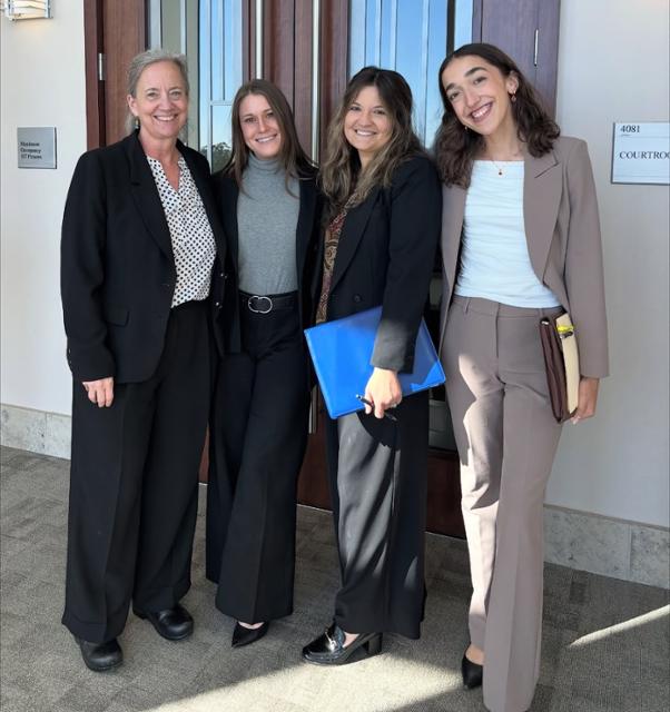 Lauren Choate with Professor Susan McGraugh and clinic students Lauren Choate with Professor Susan McGraugh and students