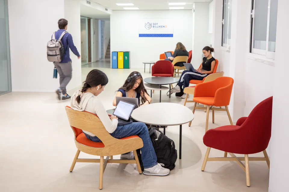 Students waiting for classes at Manresa Hall lounge.