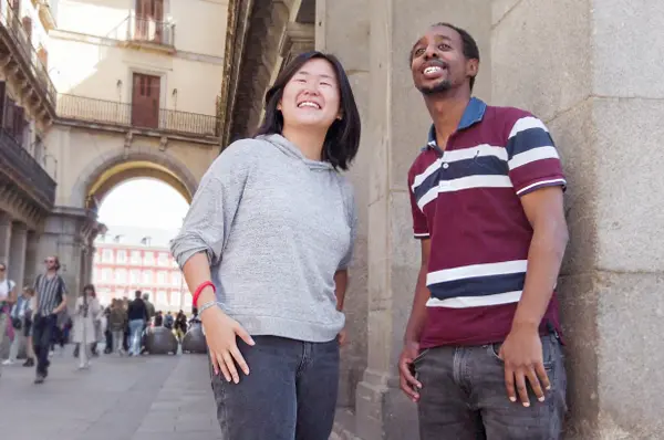 SLU students take a selfie together with a waterfall in the background.