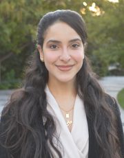 Headshot of Mona Amer