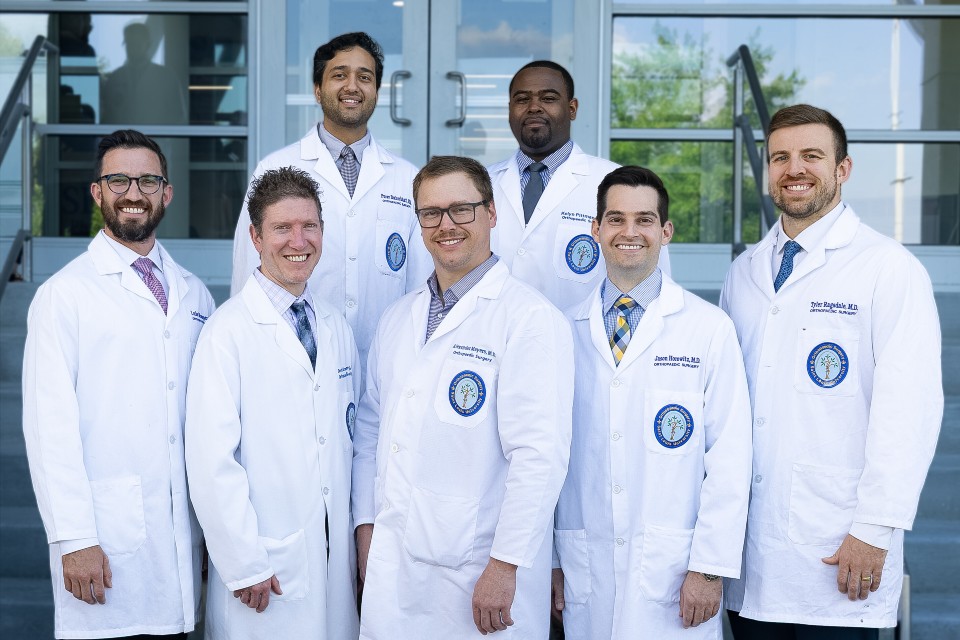 A group photo of the orthopaedic surgery department chair, fellow and fifth-year residents