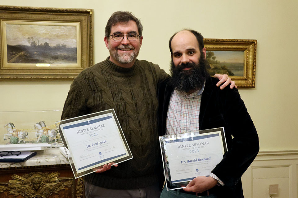 Paul Lynch, Ph.D., left, and Harold Braswell, right, are the inaugural winners of the University Core’s 2023 Ignite Instructor of the Year Award. Photo by Joe Barker.
