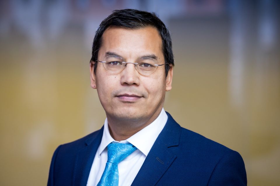 Vasit Sagan pose for a photo.