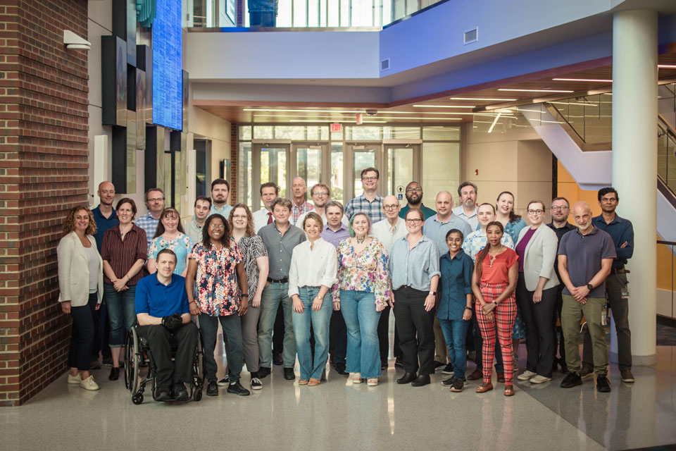 chemistry group photo Group photo showing SLU chemistry faculty standing in an atrium